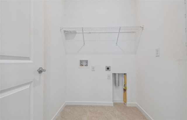 laundry room with light tile patterned flooring, hookup for an electric dryer, and hookup for a washing machine