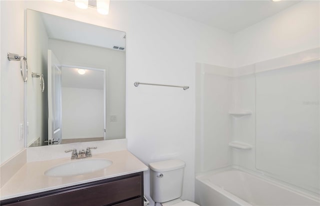 full bathroom featuring vanity, shower / washtub combination, and toilet