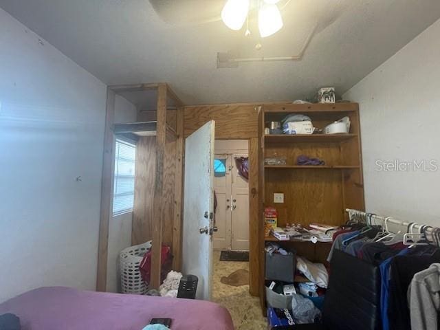 bedroom featuring ceiling fan