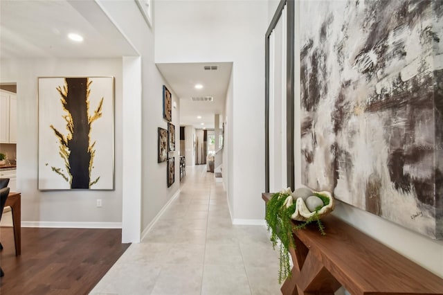 hallway with light wood-type flooring