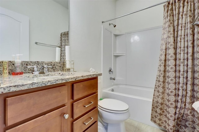 full bathroom with tile patterned floors, vanity, toilet, and shower / tub combo