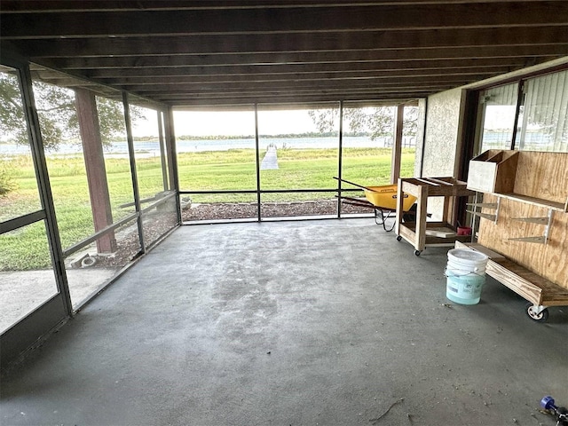 unfurnished sunroom featuring plenty of natural light