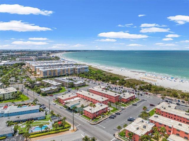 bird's eye view featuring a view of the beach and a water view