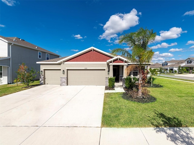 view of front facade with a garage and a front lawn