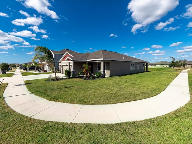 view of property exterior featuring a yard and a garage