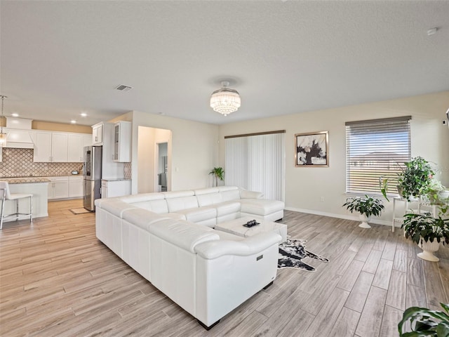 living room featuring light hardwood / wood-style flooring