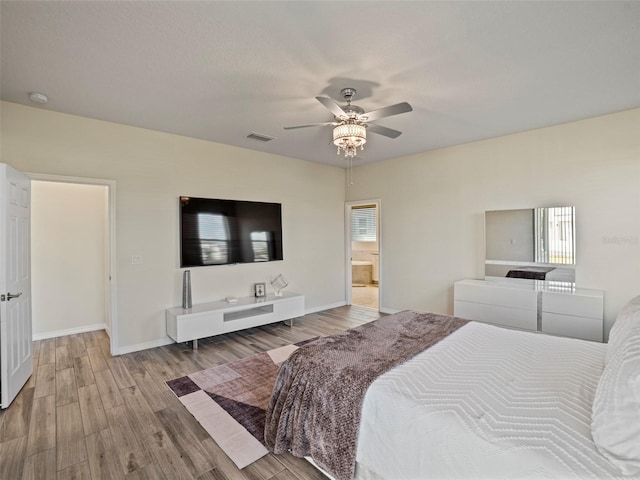 bedroom with light wood-type flooring and ceiling fan