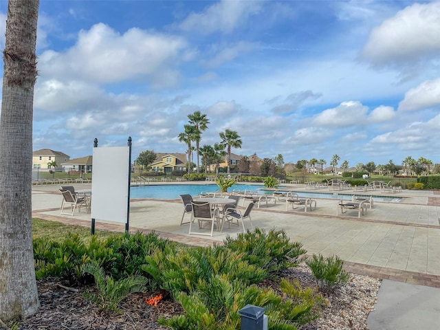 view of pool featuring a patio area