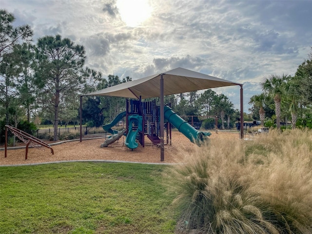 view of playground featuring a lawn