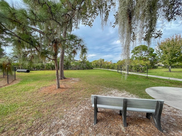 view of home's community featuring a yard