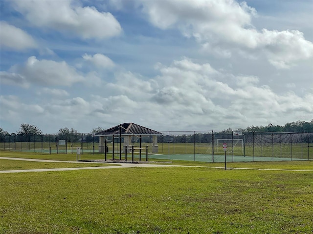 view of property's community with a lawn