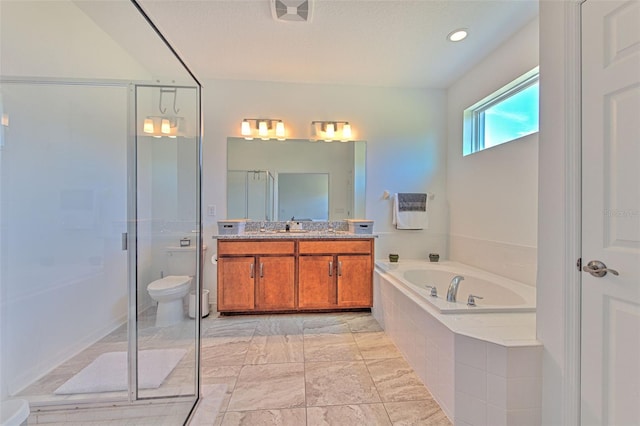 full bathroom featuring vanity, toilet, and independent shower and bath