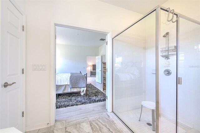 bathroom with an enclosed shower