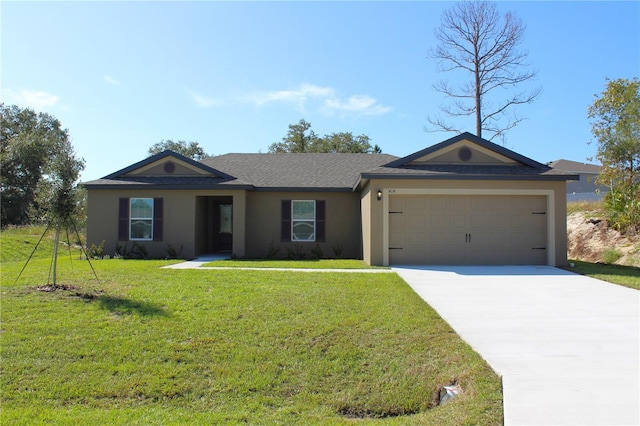 single story home featuring a front lawn and a garage