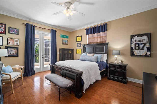 bedroom with ceiling fan, french doors, crown molding, access to outside, and hardwood / wood-style flooring