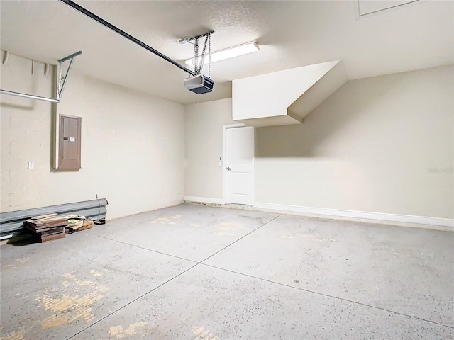 garage with electric panel and a garage door opener