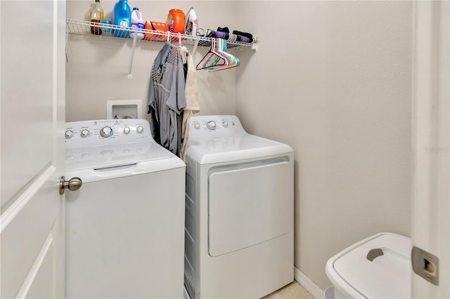 laundry area featuring washer and clothes dryer