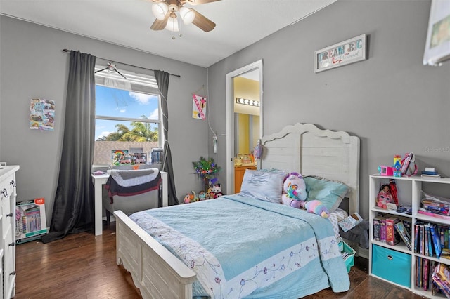 bedroom with dark wood-type flooring and ceiling fan