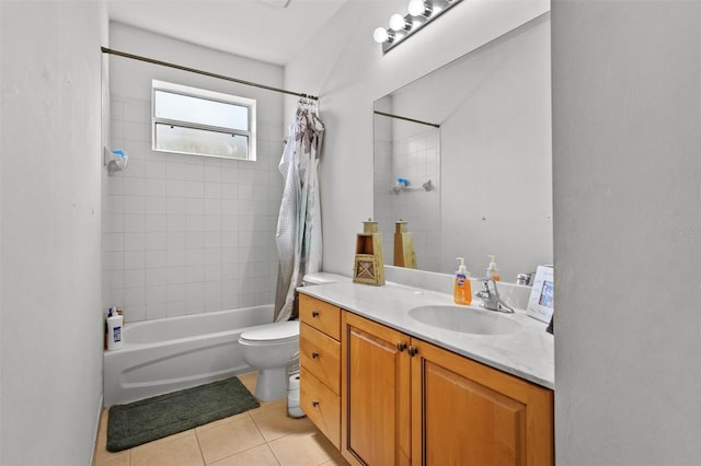 bathroom with toilet, shower / tub combo, vanity, and tile patterned floors