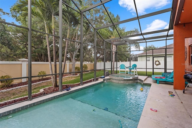 view of pool featuring a lanai, a fenced backyard, a pool with connected hot tub, and a patio