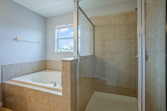 bathroom with independent shower and bath