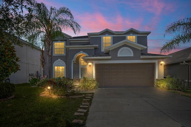 view of front of property featuring a garage