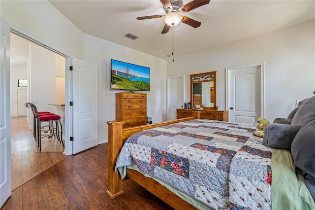 bedroom featuring dark hardwood / wood-style flooring and ceiling fan