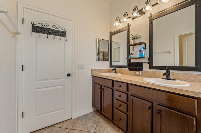 bathroom with tile patterned floors and vanity