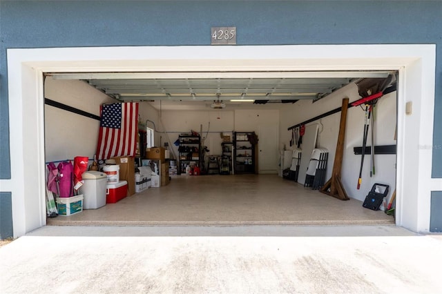 garage featuring a garage door opener