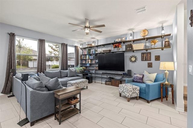 living room with ceiling fan