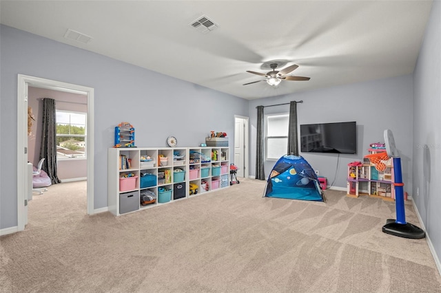 rec room featuring carpet floors and ceiling fan