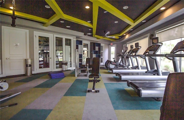 gym with coffered ceiling