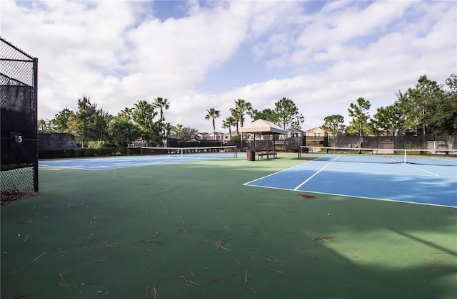 view of tennis court with basketball court