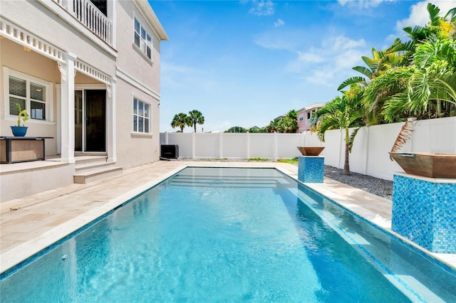 view of pool with a patio area