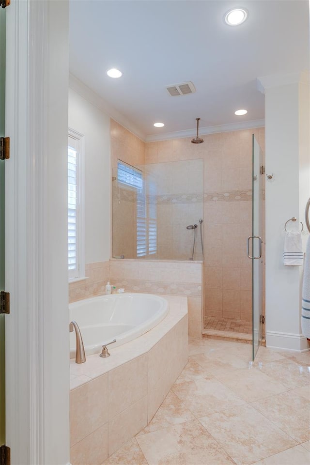 bathroom featuring independent shower and bath and crown molding