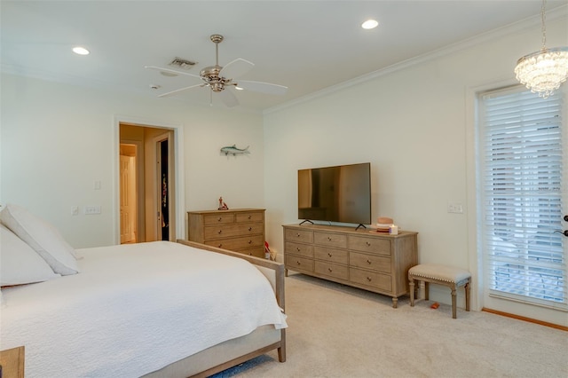 bedroom with a walk in closet, light colored carpet, ceiling fan with notable chandelier, and ornamental molding