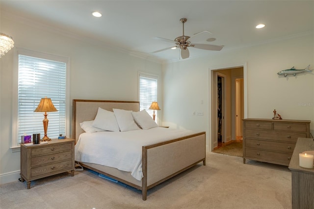 bedroom with light carpet, ceiling fan, and ornamental molding