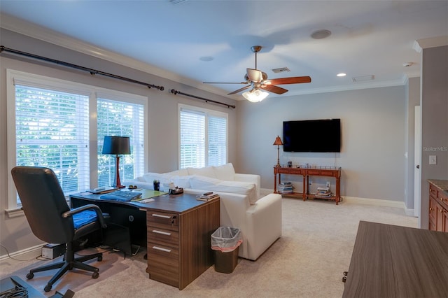 carpeted office space featuring ceiling fan and ornamental molding