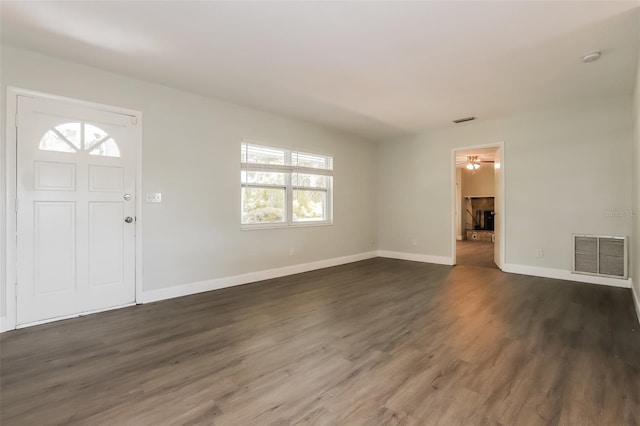 foyer entrance with dark hardwood / wood-style flooring