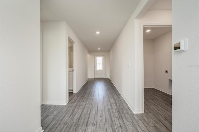 hallway with light wood-type flooring