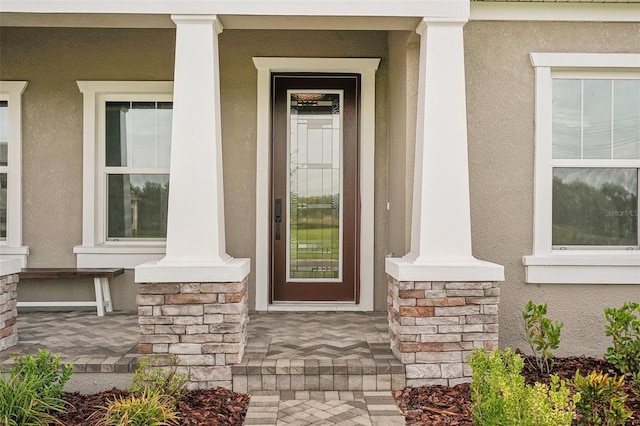 entrance to property with a porch