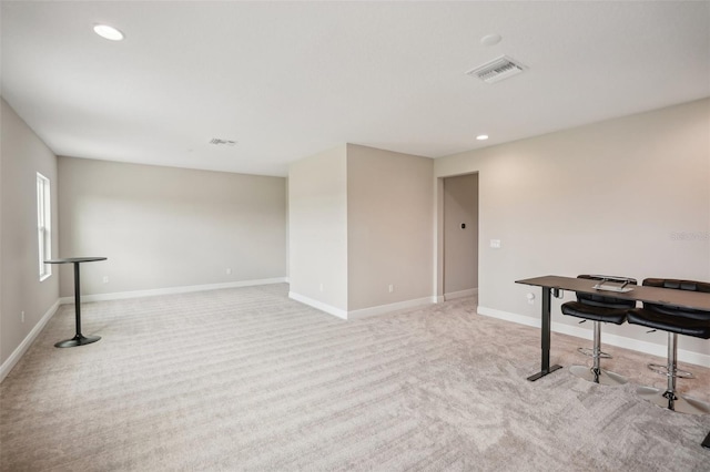 interior space with light colored carpet