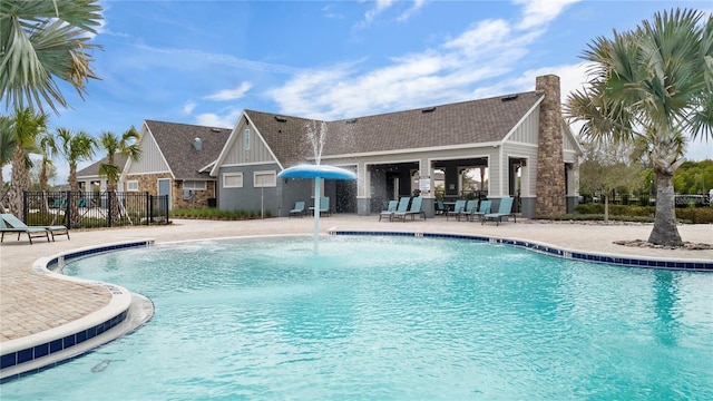 view of pool featuring a patio area and pool water feature