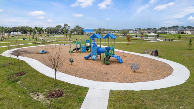 view of playground featuring a yard