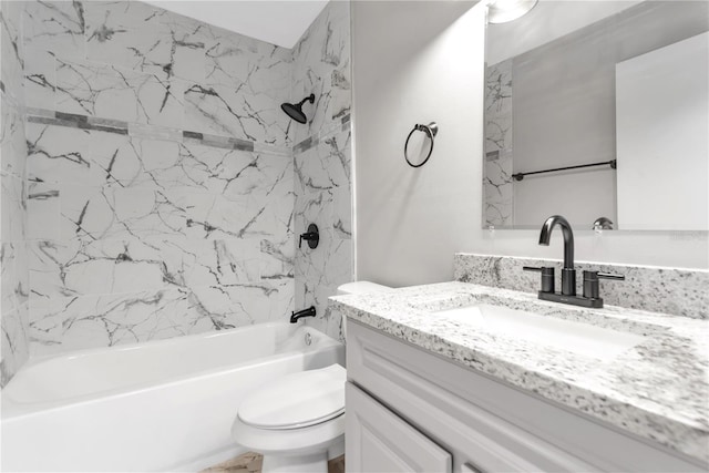 bathroom with vanity, shower / tub combination, and toilet