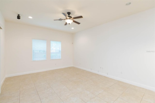 spare room featuring ceiling fan