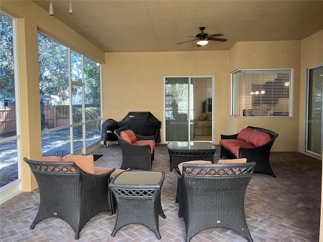 view of patio / terrace featuring ceiling fan