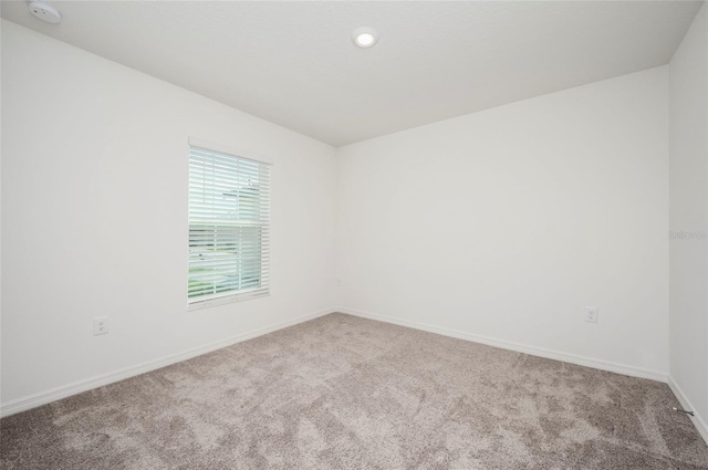 empty room with carpet floors