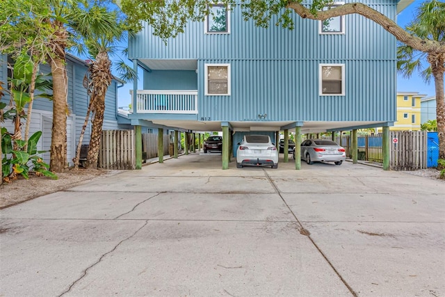 beach home with a carport and a balcony