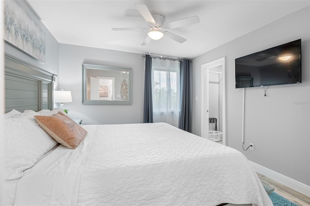 bedroom featuring ceiling fan and hardwood / wood-style floors